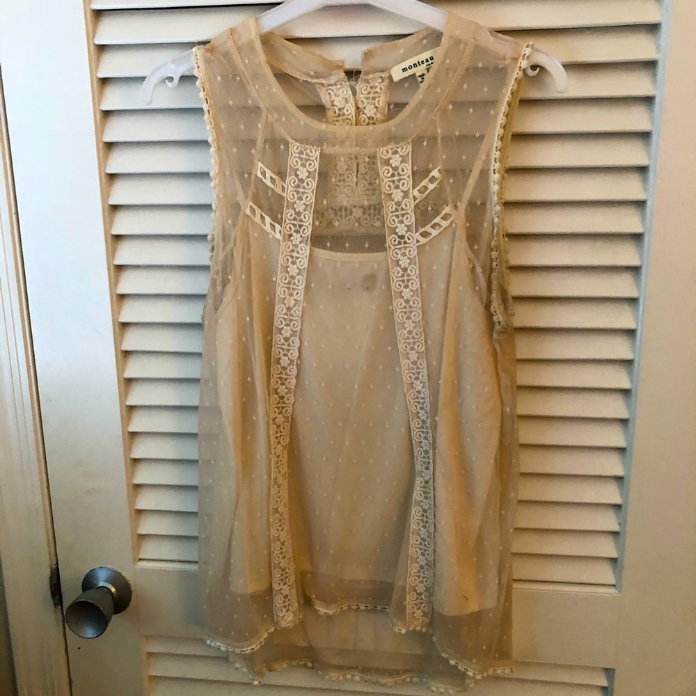 Size medium lace cream color blouse
